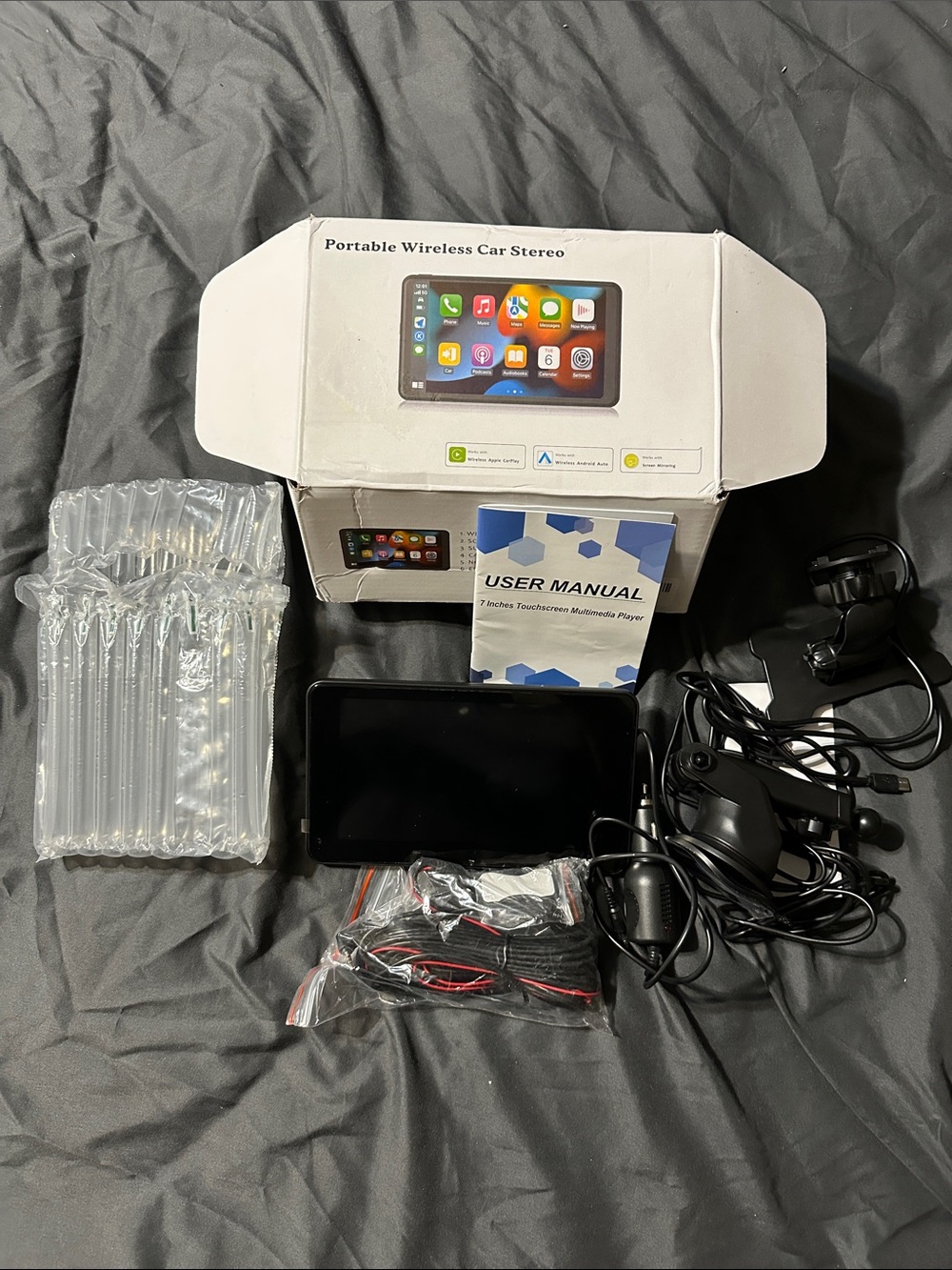Portable wireless touchscreen display.  Apple CarPlay, and android compatible.